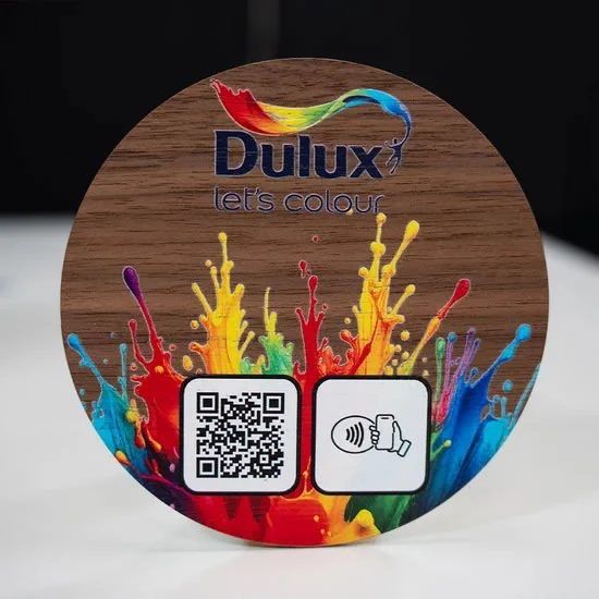 Natural wooden NFC plate with epoxy finish, printed artwork, QR code and NFC tap icon