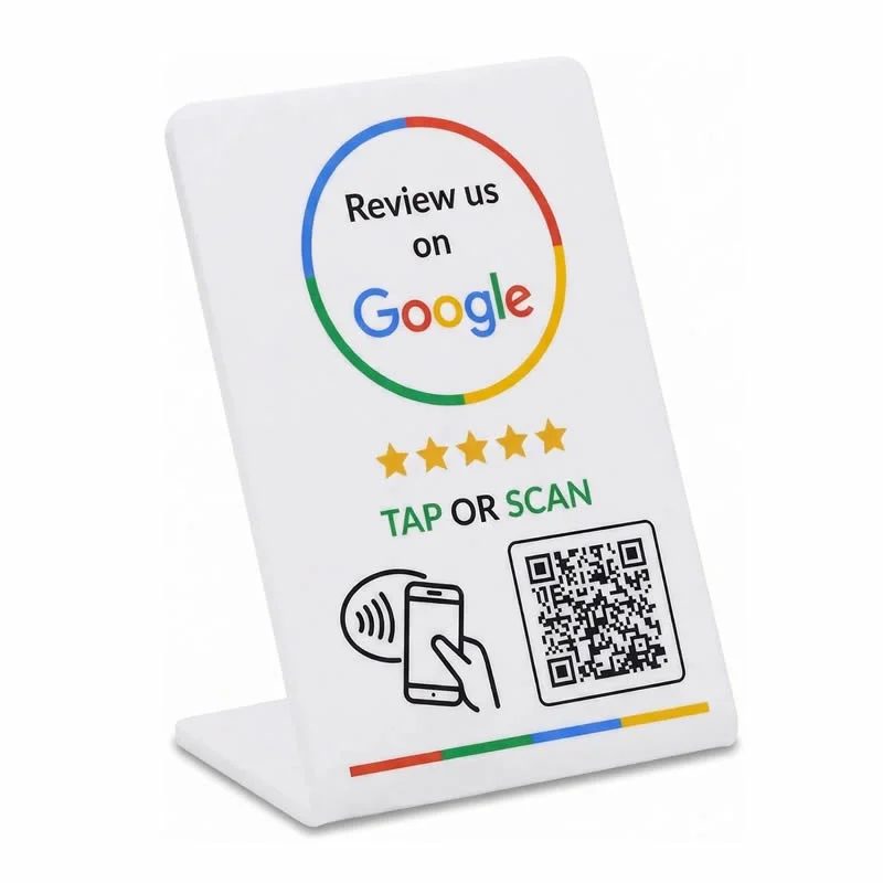 NFC stand displaying a Google review sign with stars and a QR code for tap-to-review